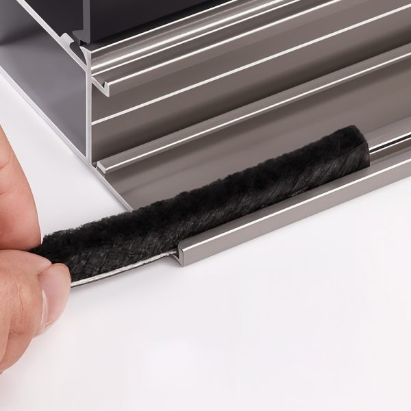 The Fabtex light blocking brush is inserted into a side channel.