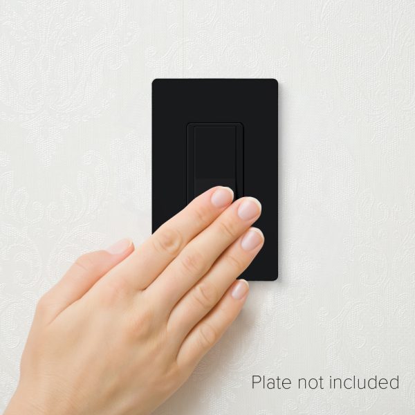 Hand operating a wall switch showing the black Fabtex momentary contact rocker switch.