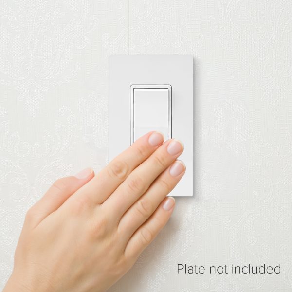 Hand operating a wall switch showing the white Fabtex momentary contact rocker switch.