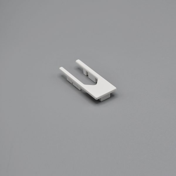 White, Fabtex side channel top end pass for roller shades. Shows the top face view.